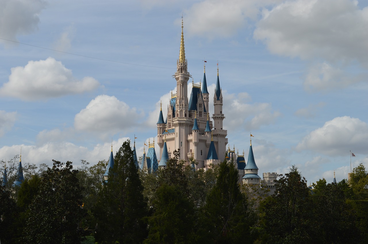 A castle like building with many spires and turrets.