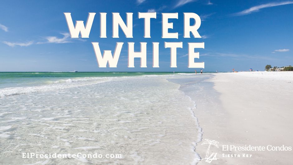 A beach with the words winter white written in front of it.